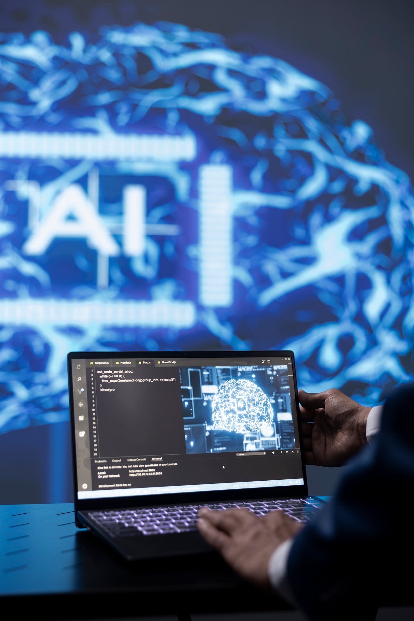 Programmer running AI cognitive computing tech on laptop